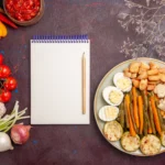 A variety of healthy diet plan foods including vegetables, fruits, nuts, and whole grains for overall health in 2026