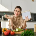 A person eating a balanced and nutritious meal representing the connection between healthy diet and positive mental health